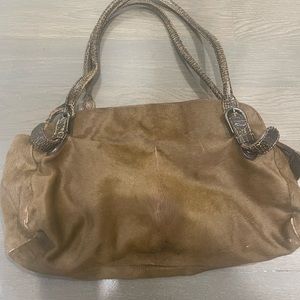 Beautiful vintage brown Miu Miu pony hair barrel bag.